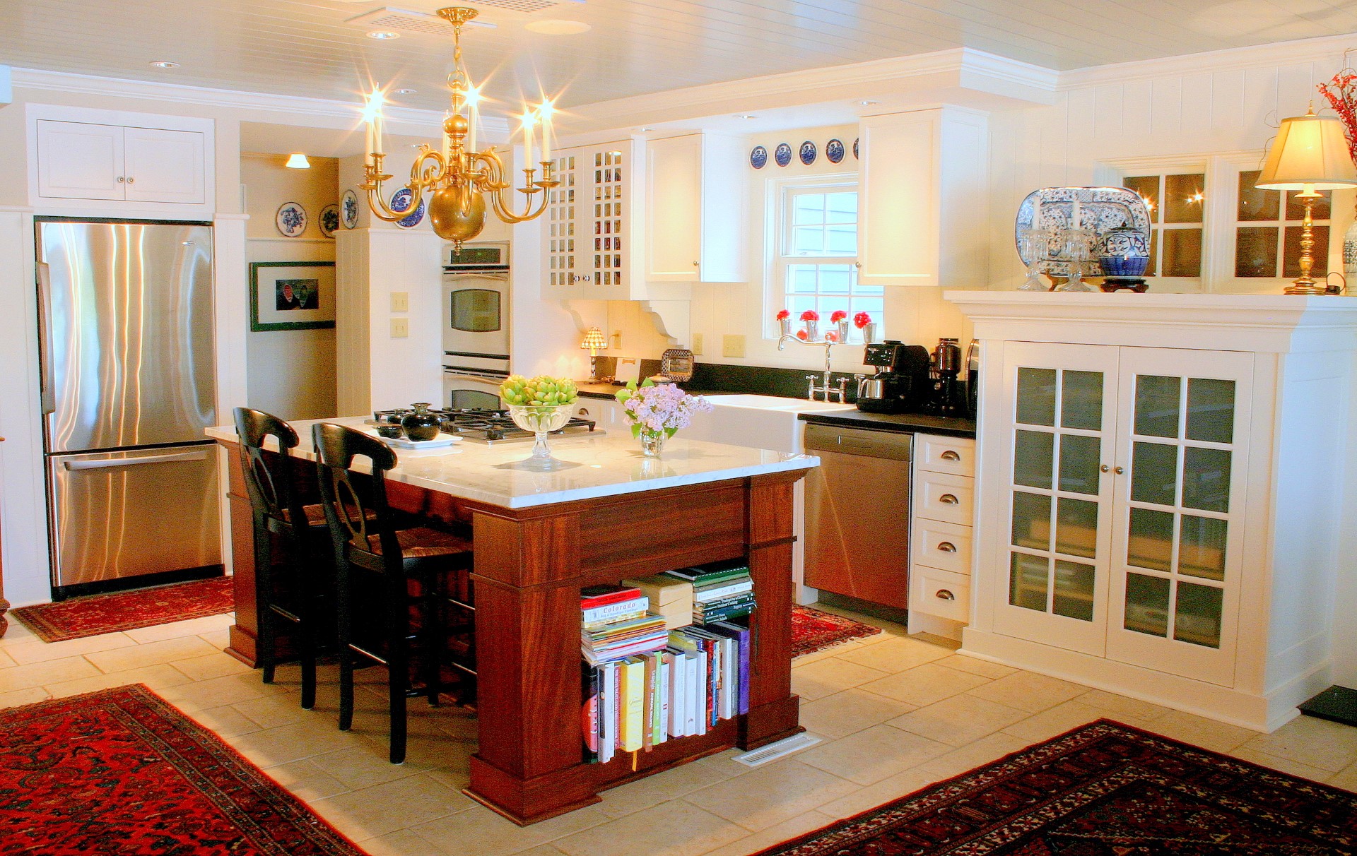 Painted kitchen with a solid mahogany island, built by Trillium for the Clearwater project